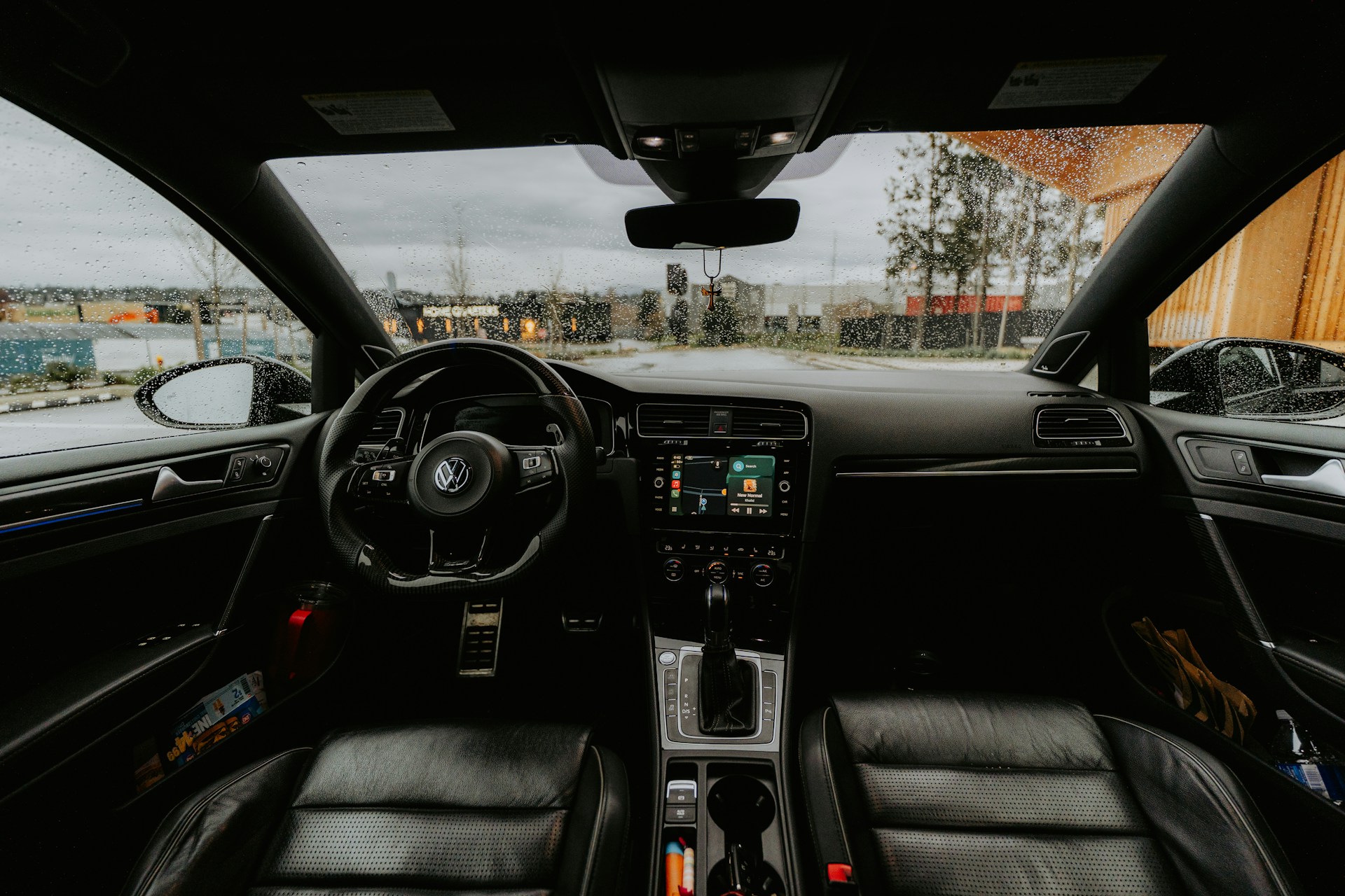 Interior view of a car with dashboard details.