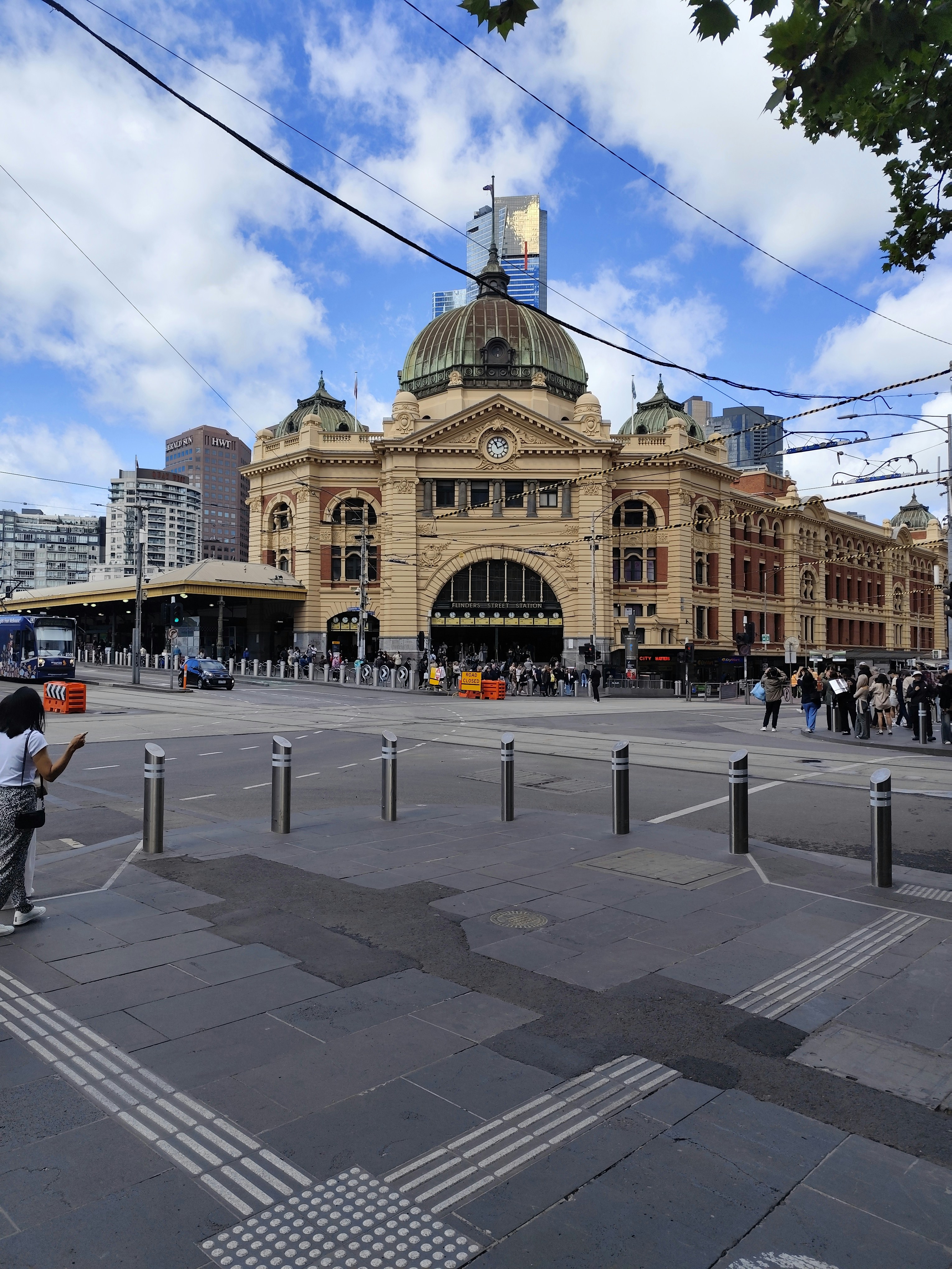 Flinders street station stands tall in melbourne.