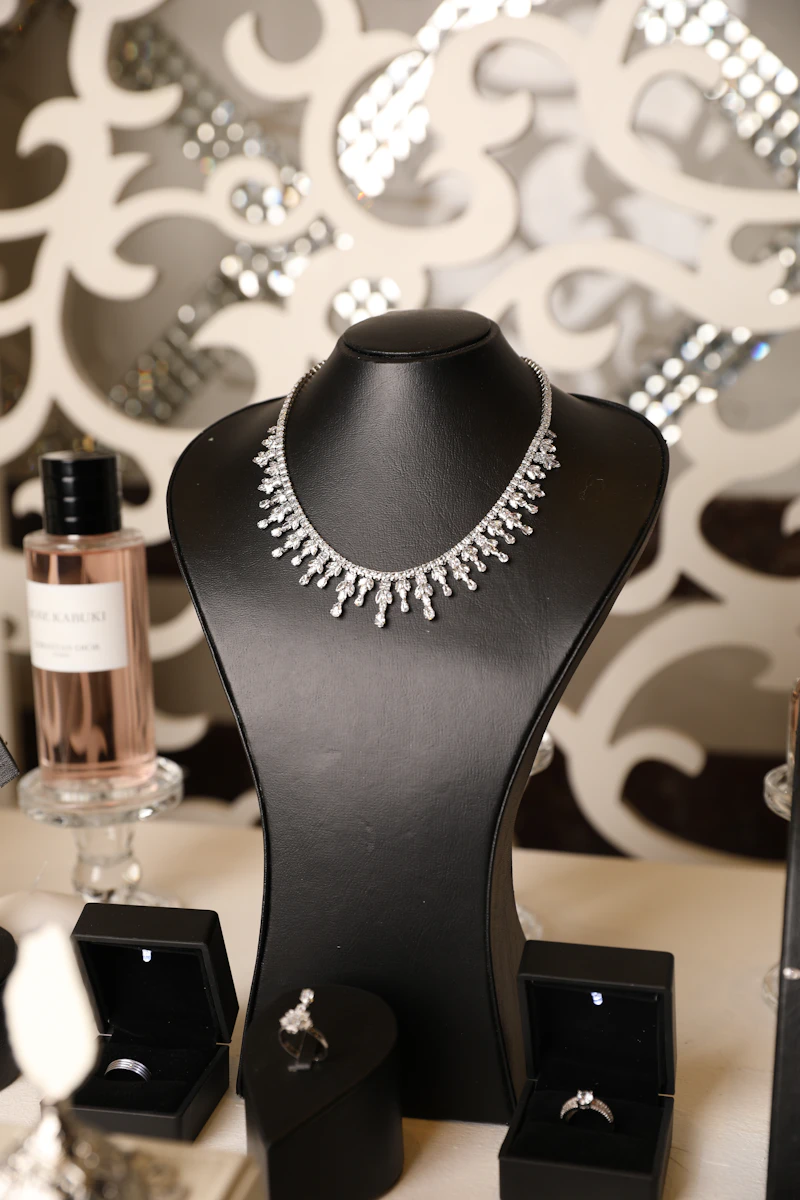 A diamond necklace displayed elegantly on a mannequin