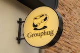 The sign reads "grouphug".