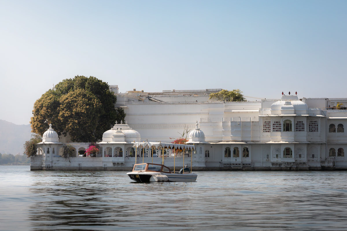 The white Lake Palace floating on Lake Pichola