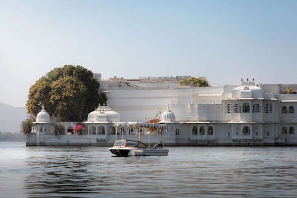 The white Lake Palace floating on Lake Pichola