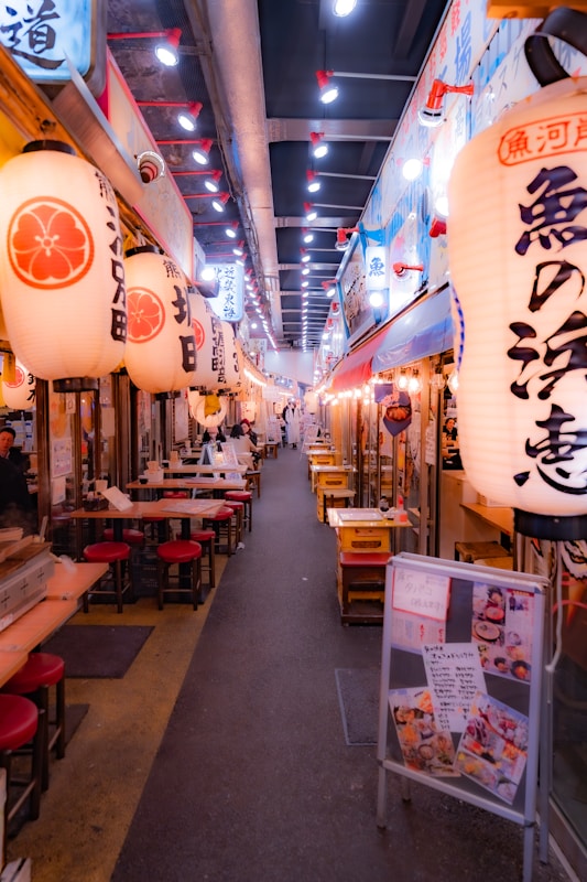 A lantern-lined dining alley in Japan, representing the food culture and local restaurant scene found across Hyogo's cities and towns