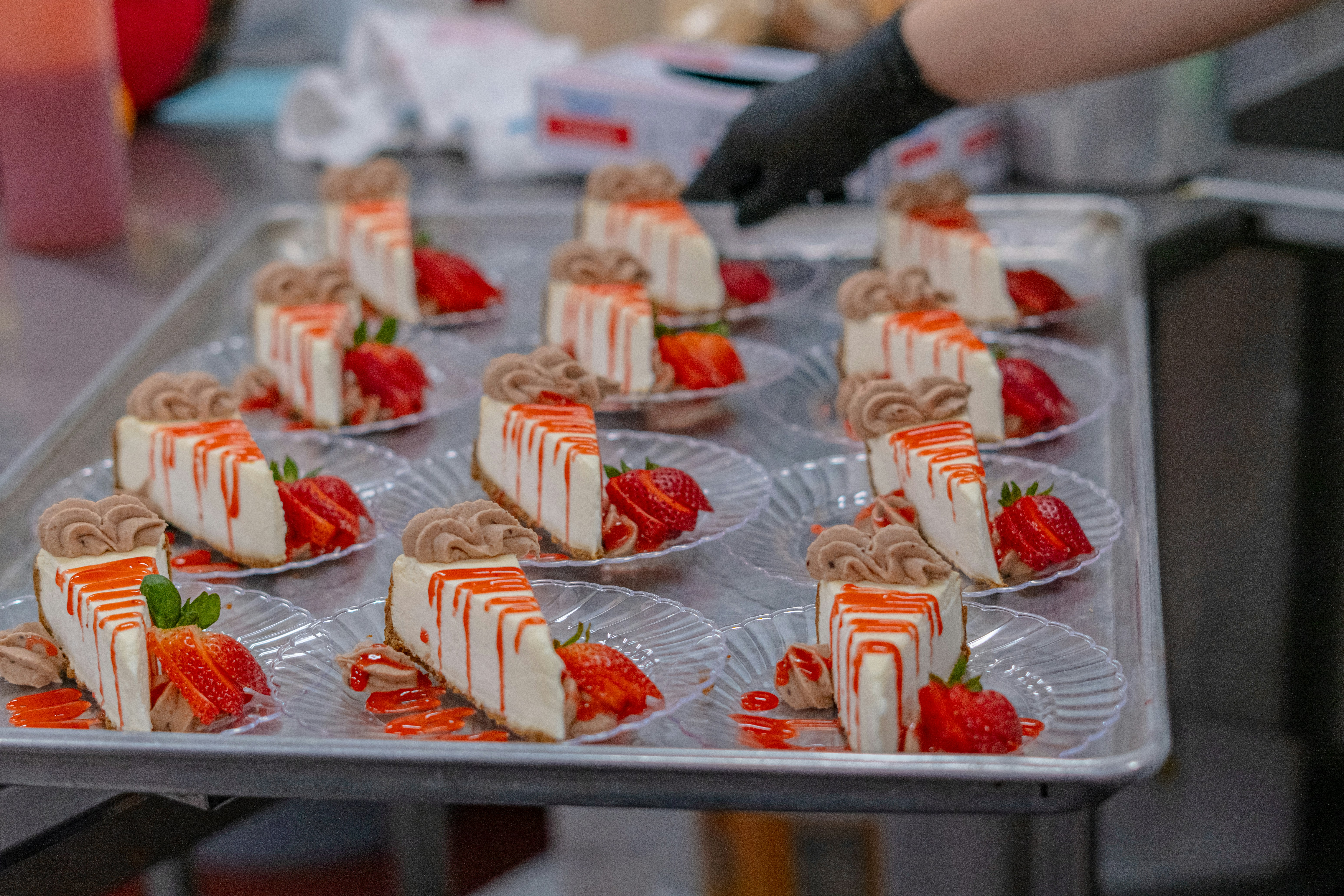 Pastry chef preparing desserts in a professional kitchen