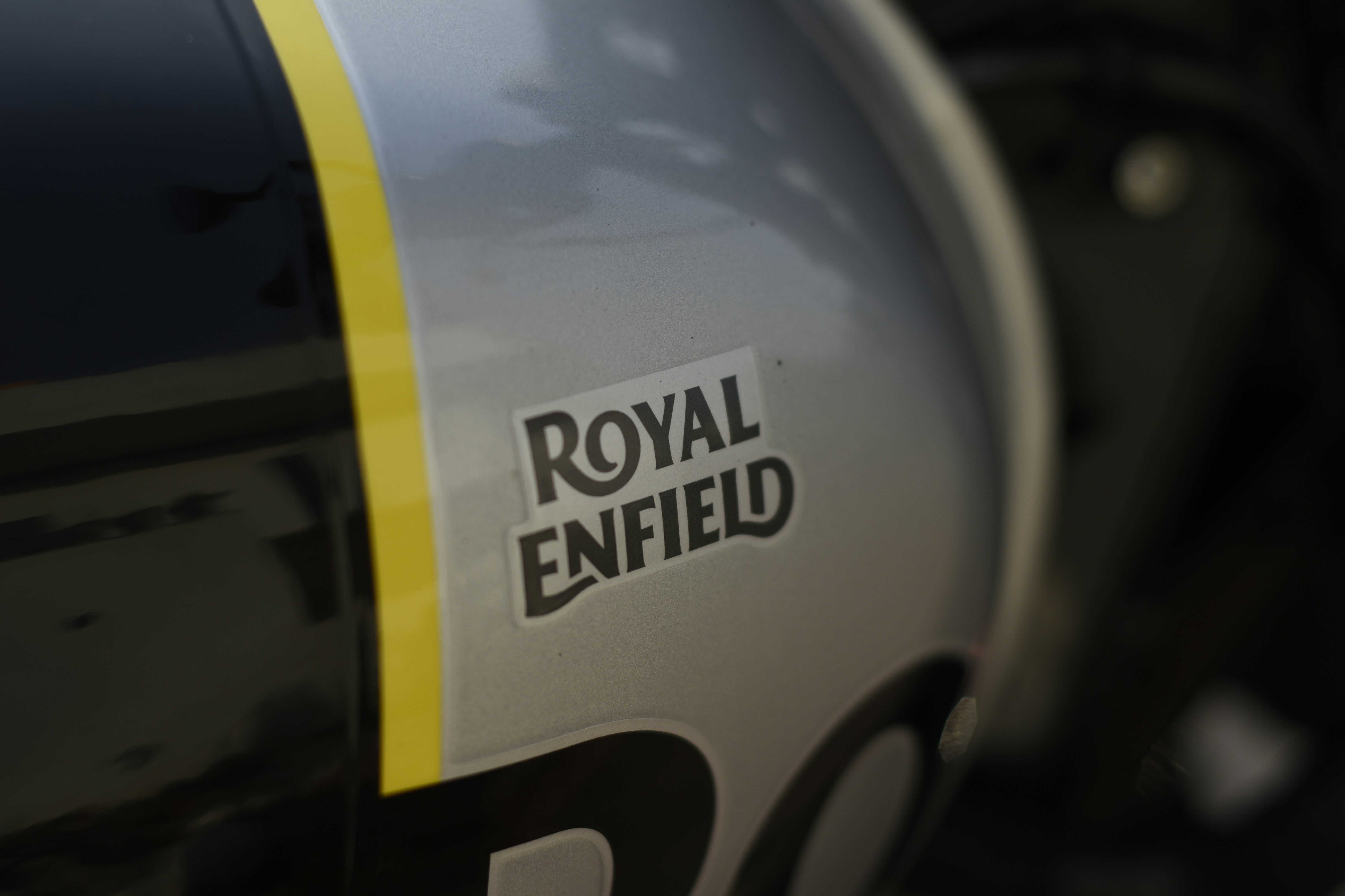 The royal enfield logo is visible on a motorcycle. photo – Free Car ...