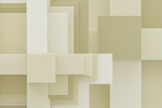 Geometric shapes overlayed in a light toned design.