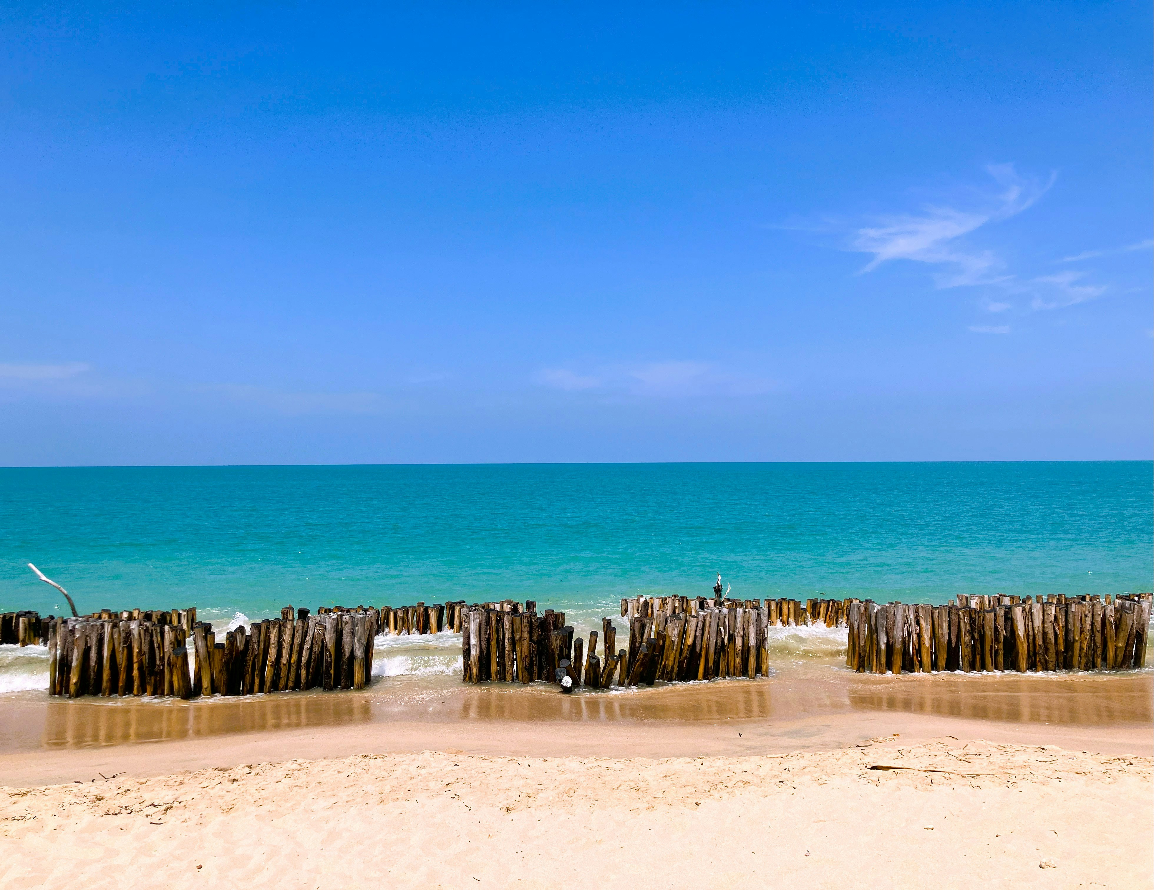 Beachfront structures beside the ocean in Thailand