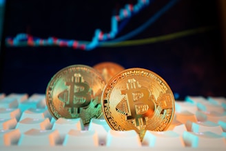 Bitcoin coins are displayed with a stock chart.