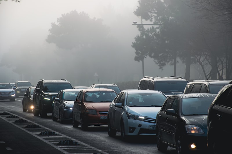 Cars stuck in traffic during heavy fog