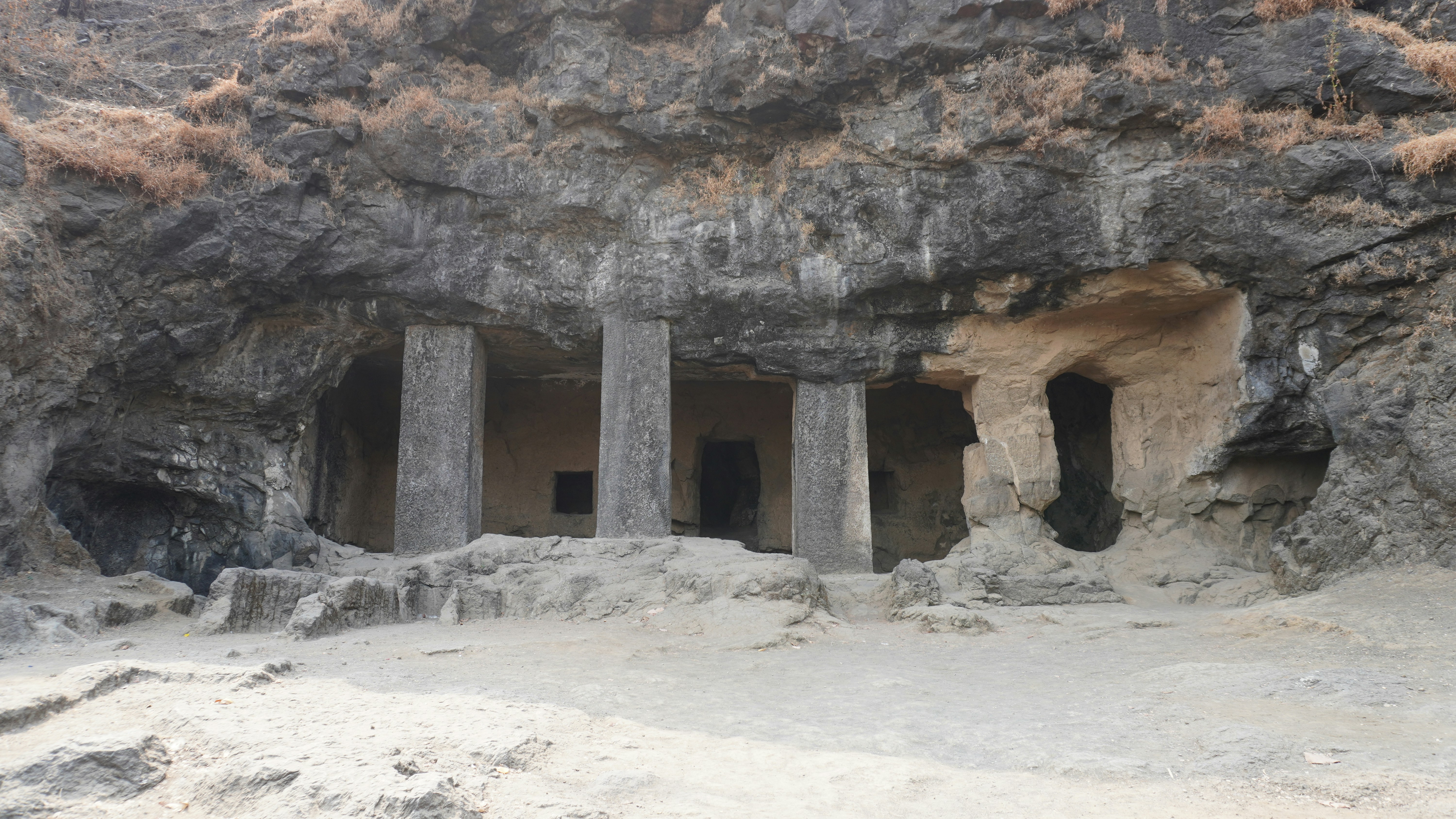 Ancient caves with columns are featured here.
