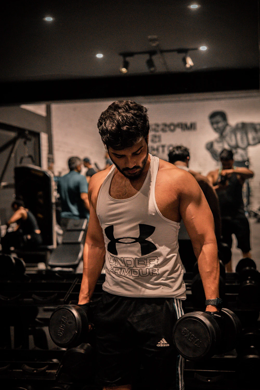 Fit, athletic man training at the gym