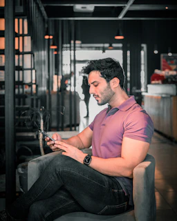 A man is looking at his phone.