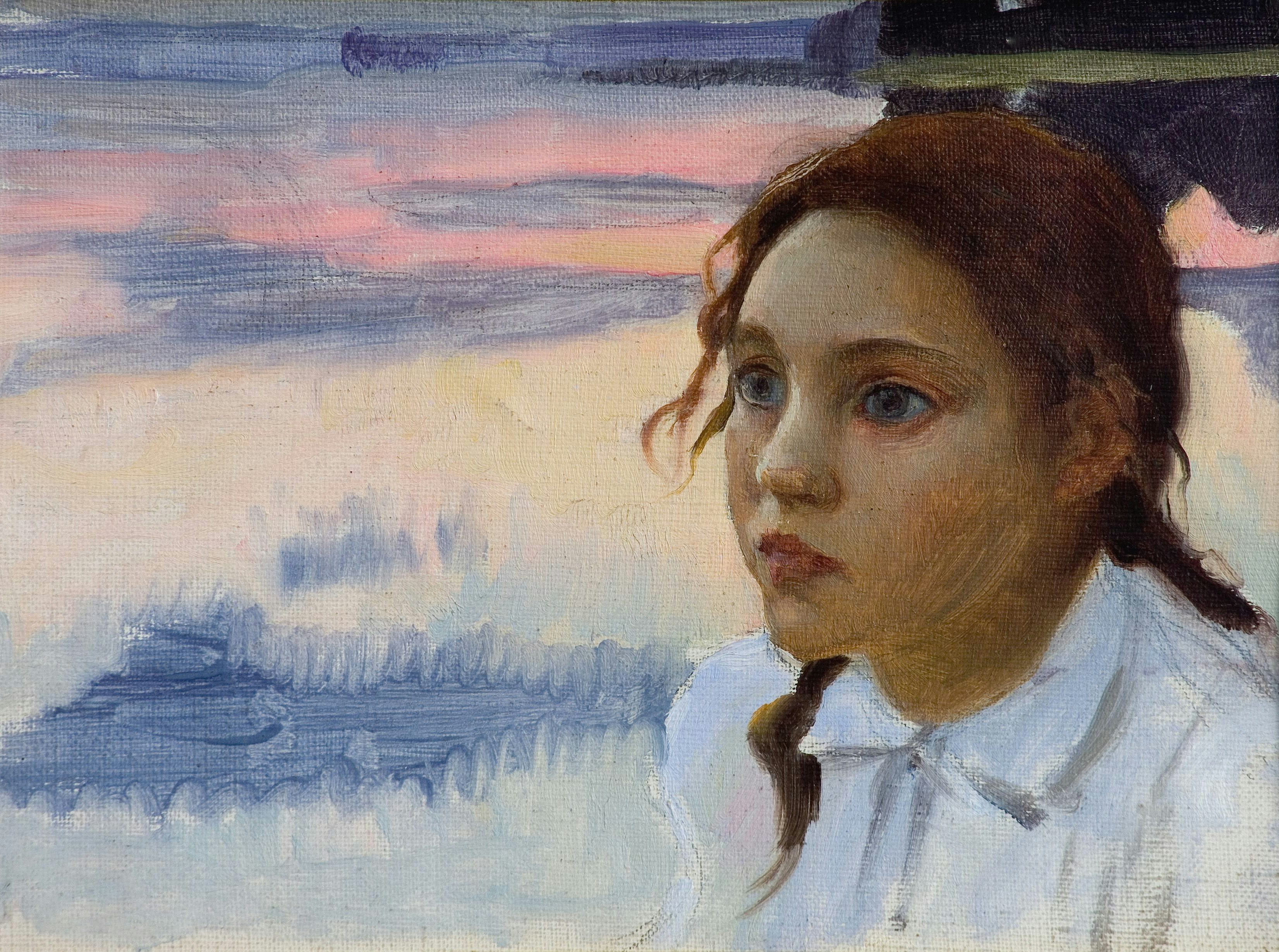 編み込まれた髪の少女が遠くを考え込むように見つめている