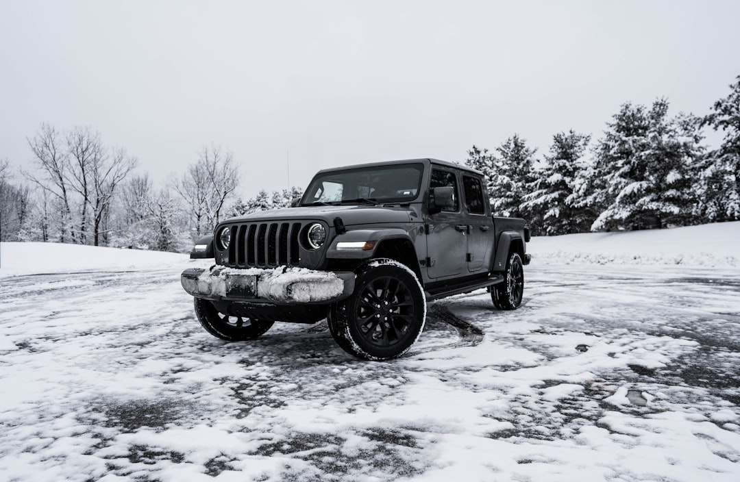 Jeep gladiator parked in a snowy landscape., Gladiator 2023