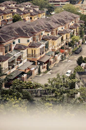 Rows of similar homes line a quiet residential street.