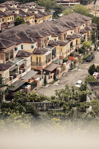 Rows of similar homes line a quiet residential street.