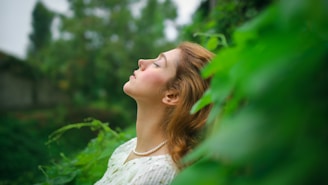 Woman peacefully enjoying nature.
