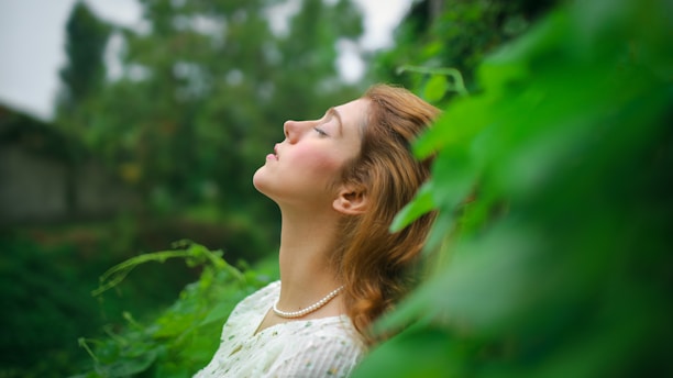 Woman peacefully enjoying nature.