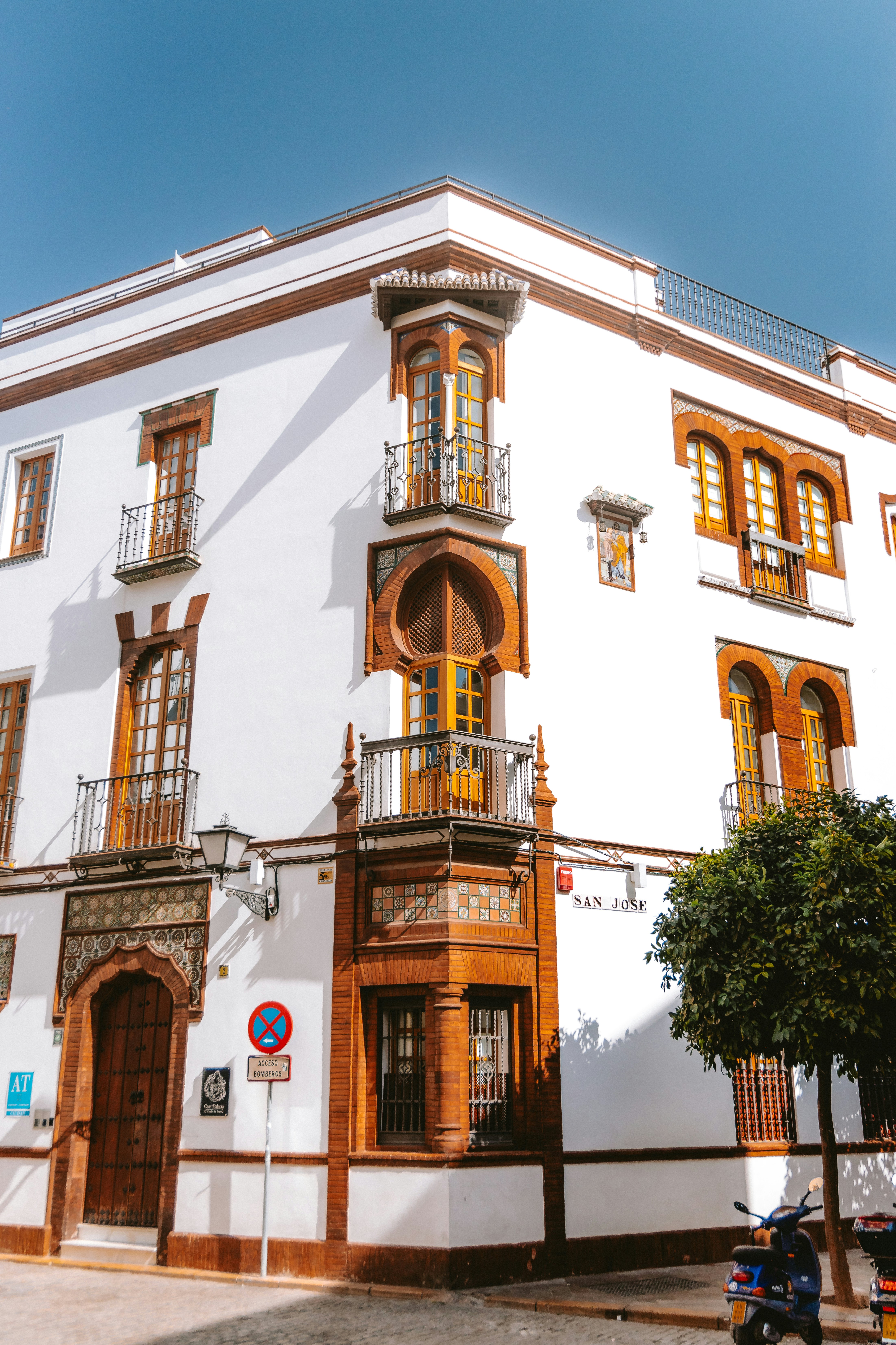 Ornate white building with unique architectural features.