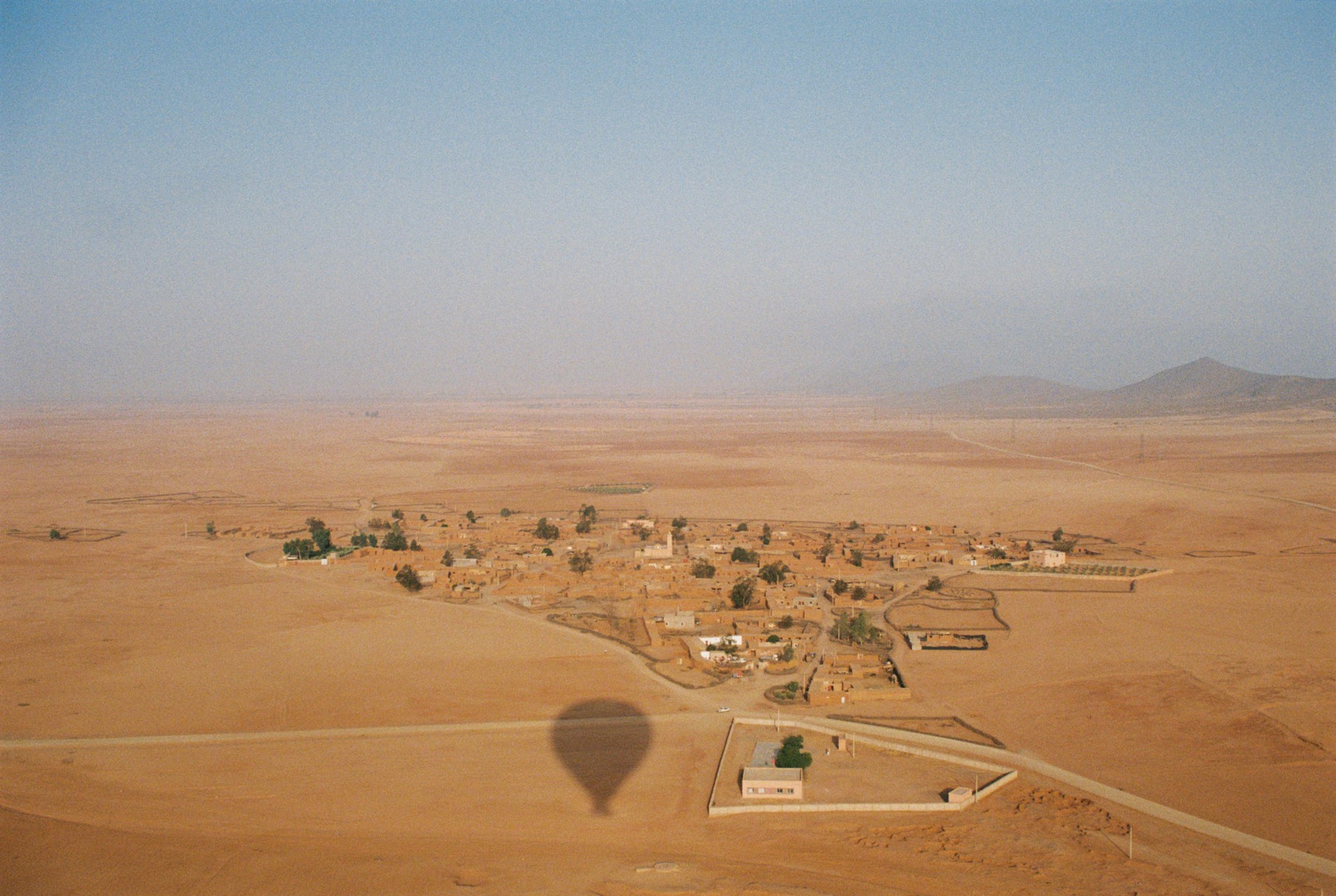 Aerial view of a village in the desert.