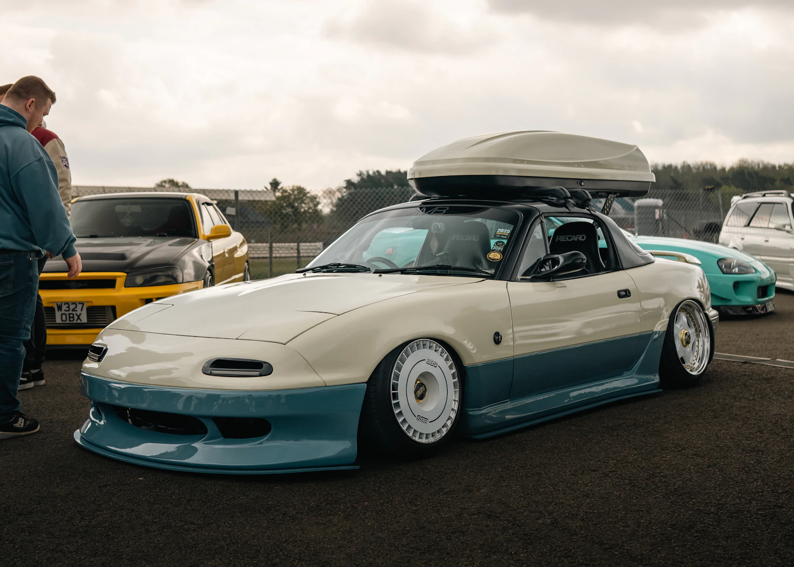 Car with a roof cargo box mounted for a family road trip