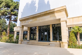 The entrance of a building with elegant architecture.