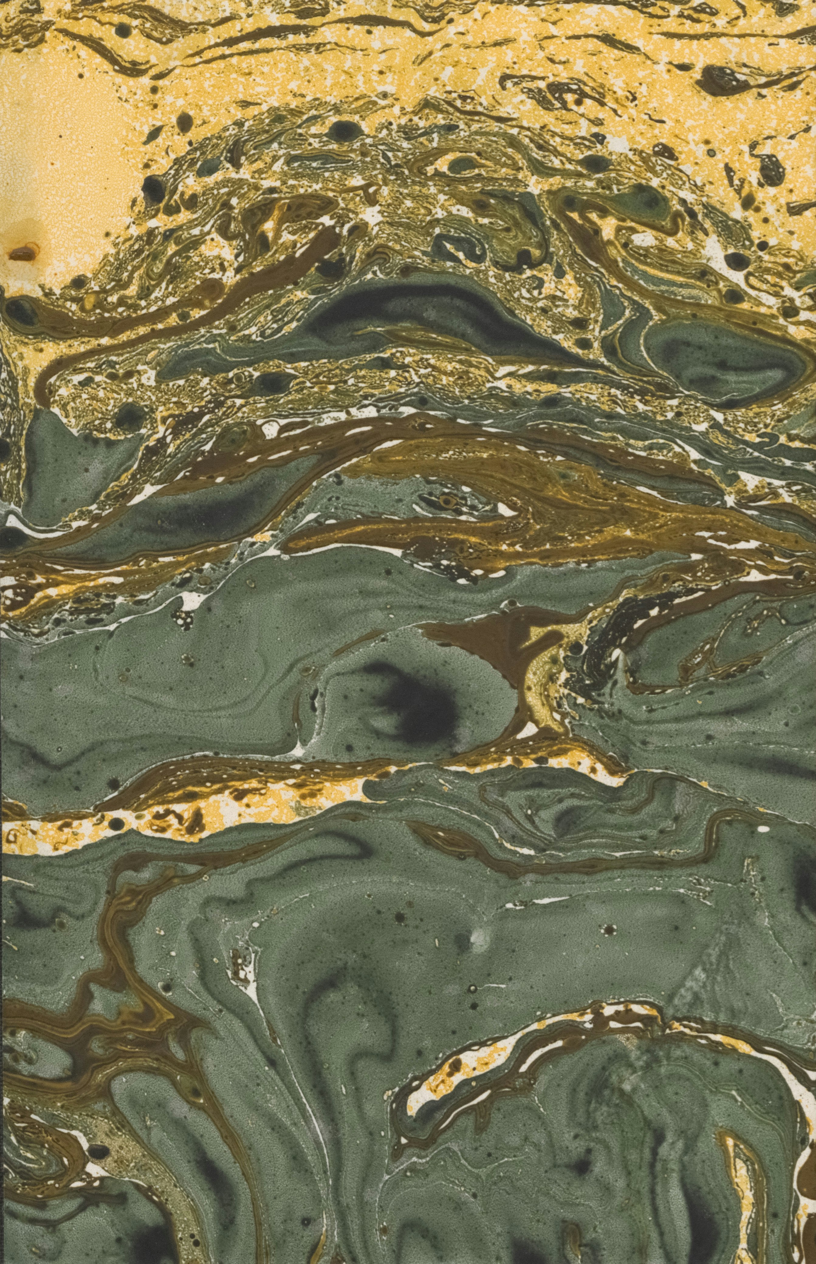 Abstract marbled pattern with green, gold, and brown swirls.