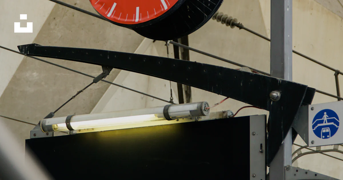 Clock Exit Sign The clock is under maintenance with an exit sign. photo – Free French ...
