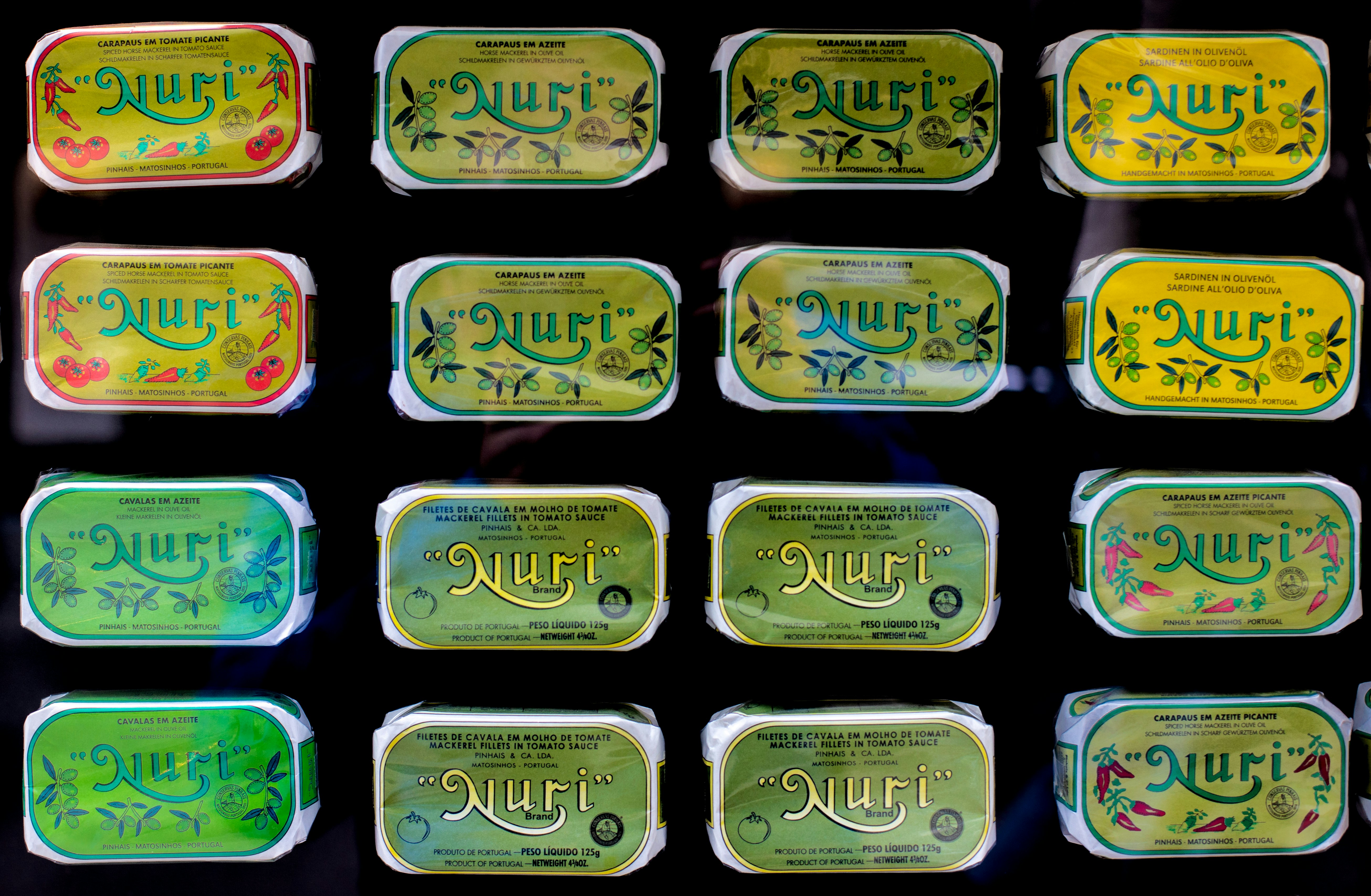 Colorful ukuleles arranged in a display