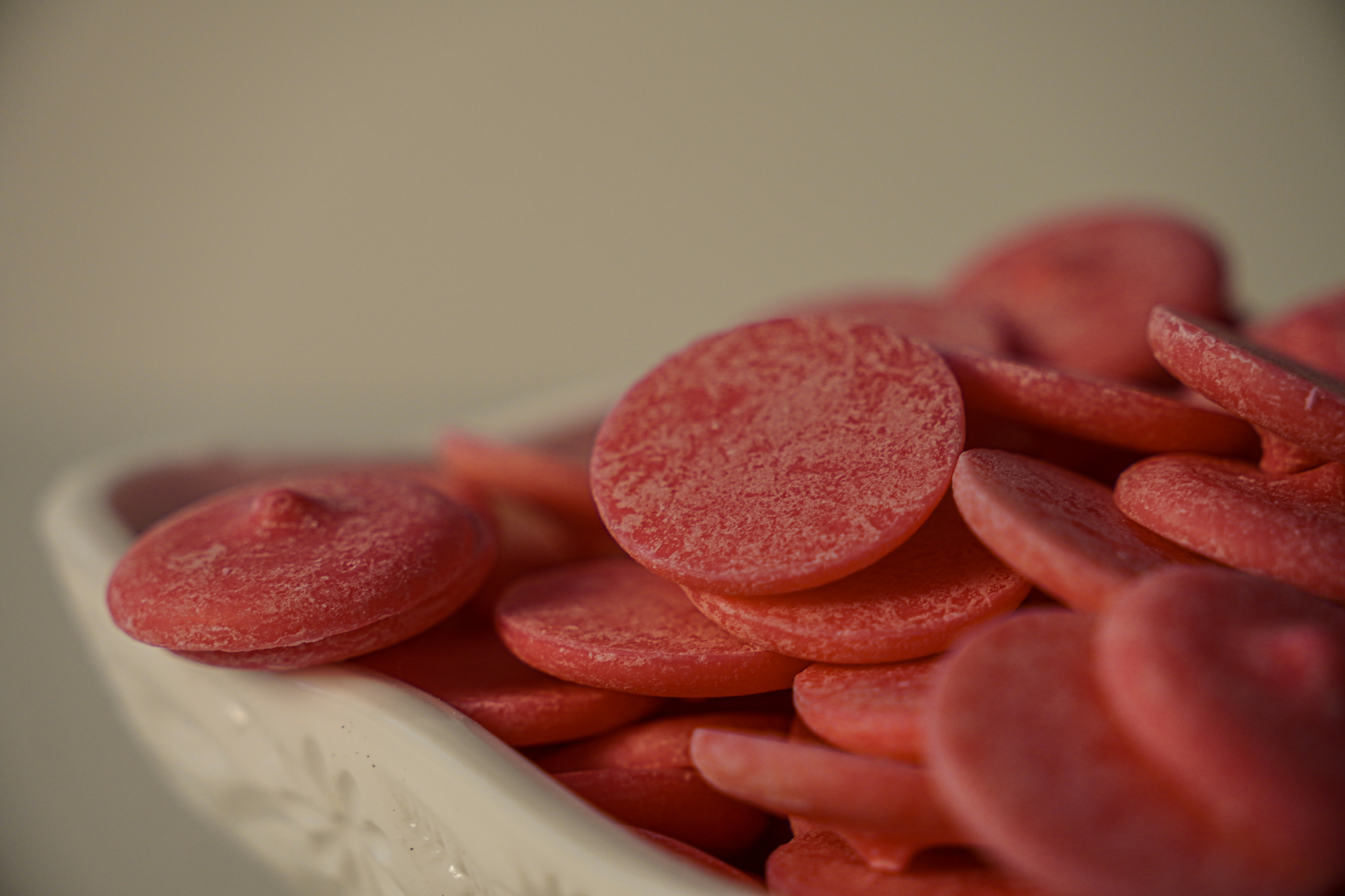 Red candy melts in decorative dish