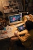 Artist creating digital art on a desk.