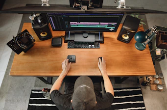 Someone is editing a video at a workstation.