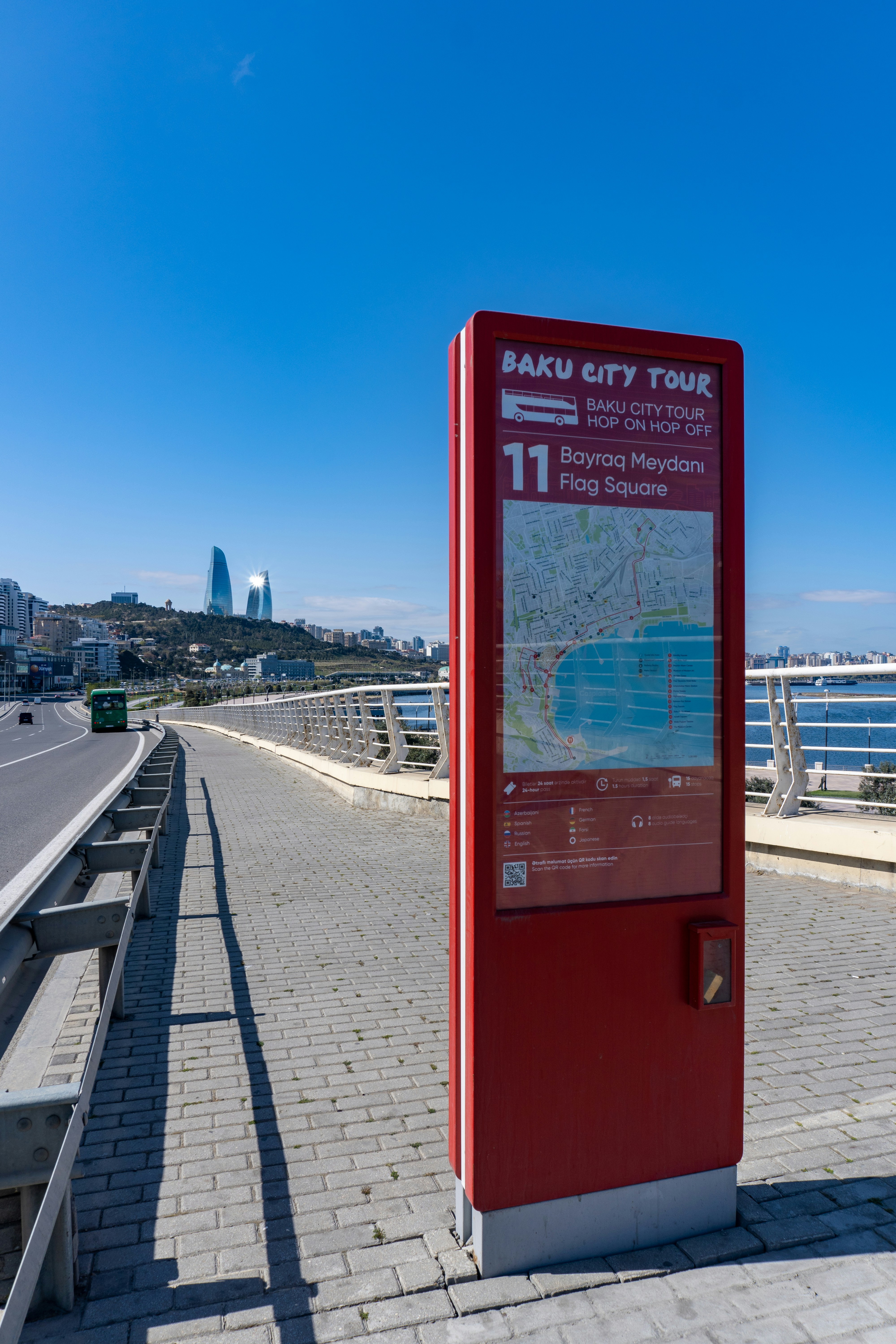 A red sign guides tourists in baku.