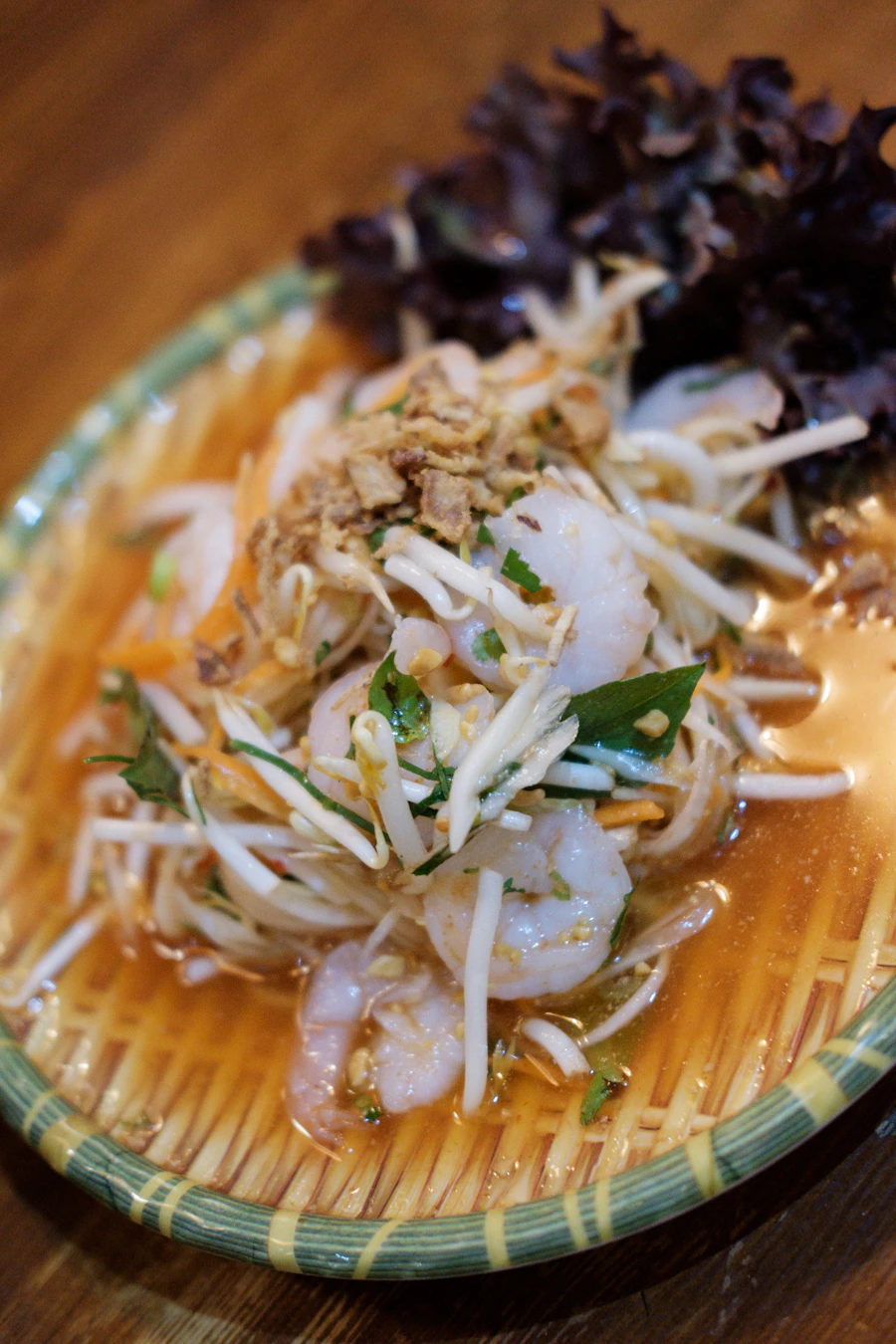 Shrimp salad served on a woven plate