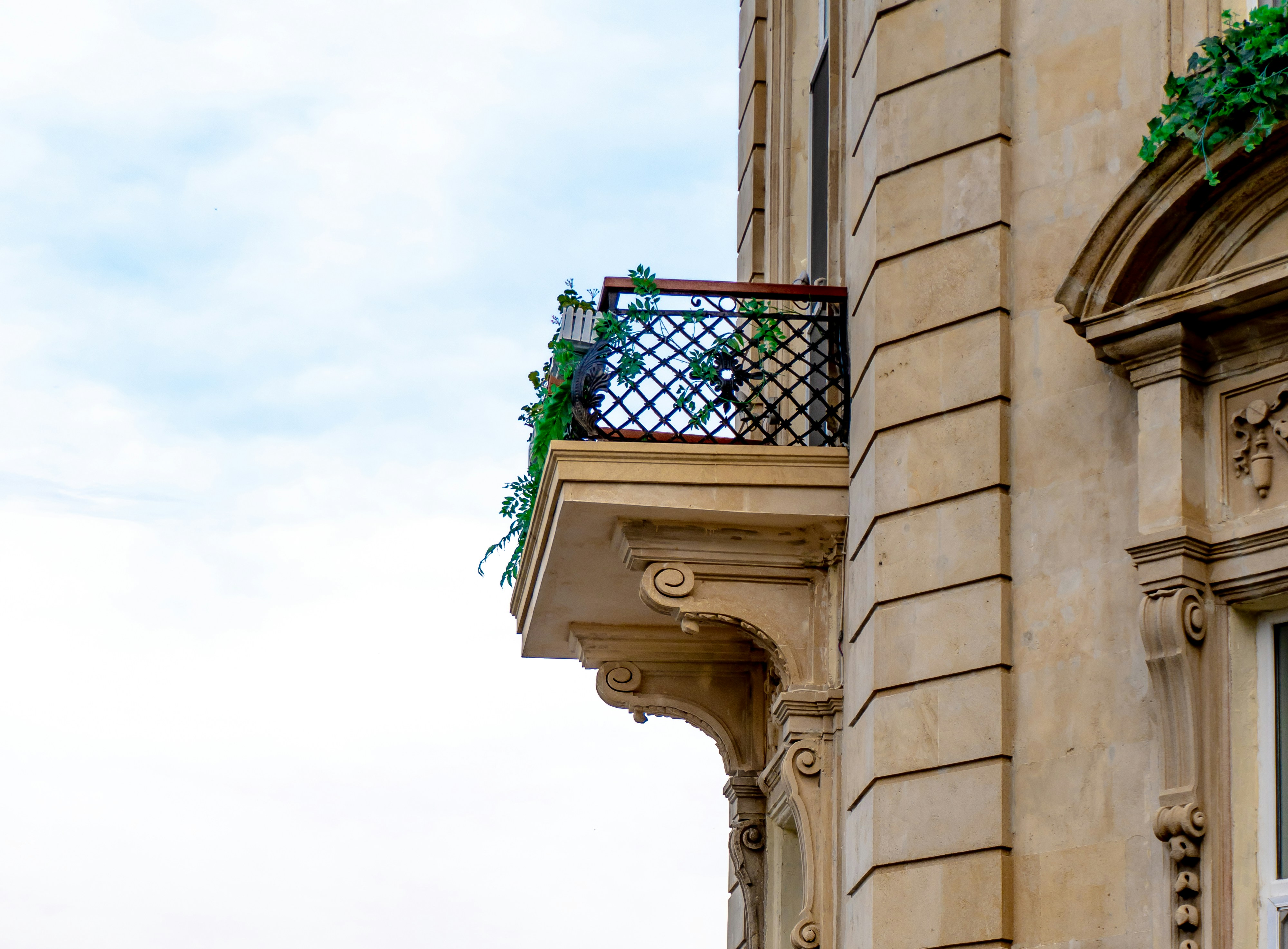 A balcony on a stone building.