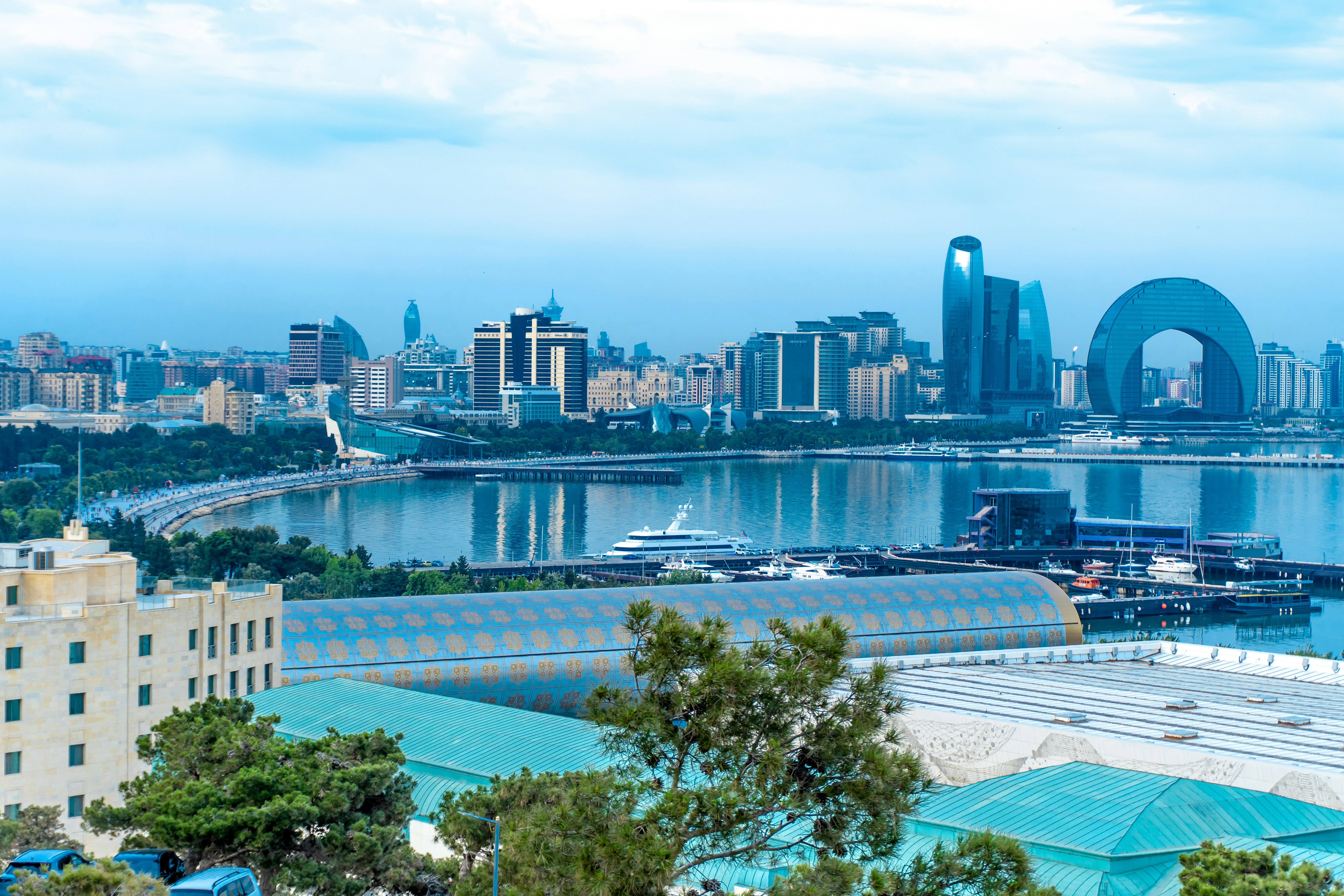 Modern buildings and water compose a cityscape.