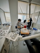 A dentist is providing care to their patient.