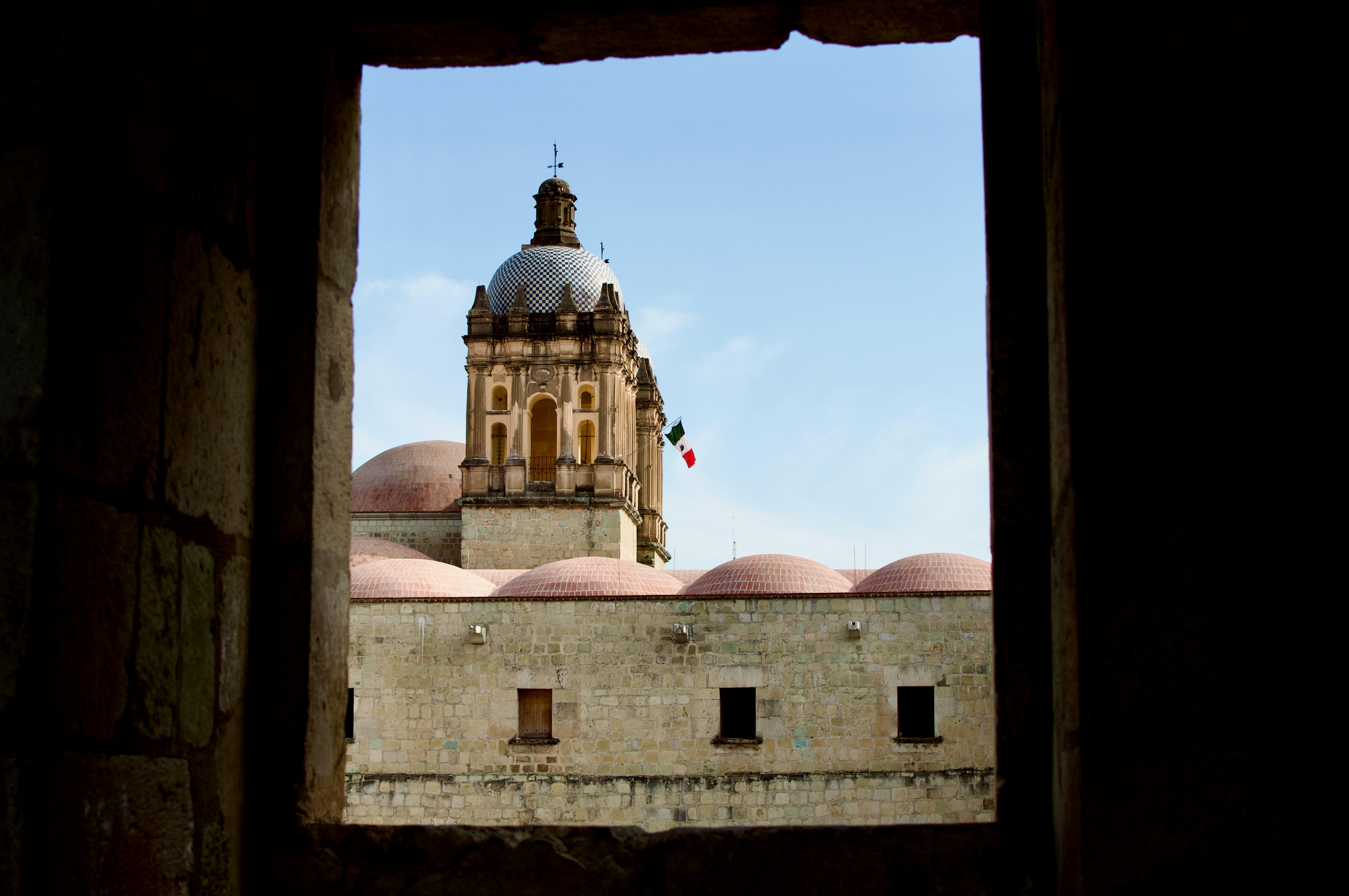 A church is framed by the window.