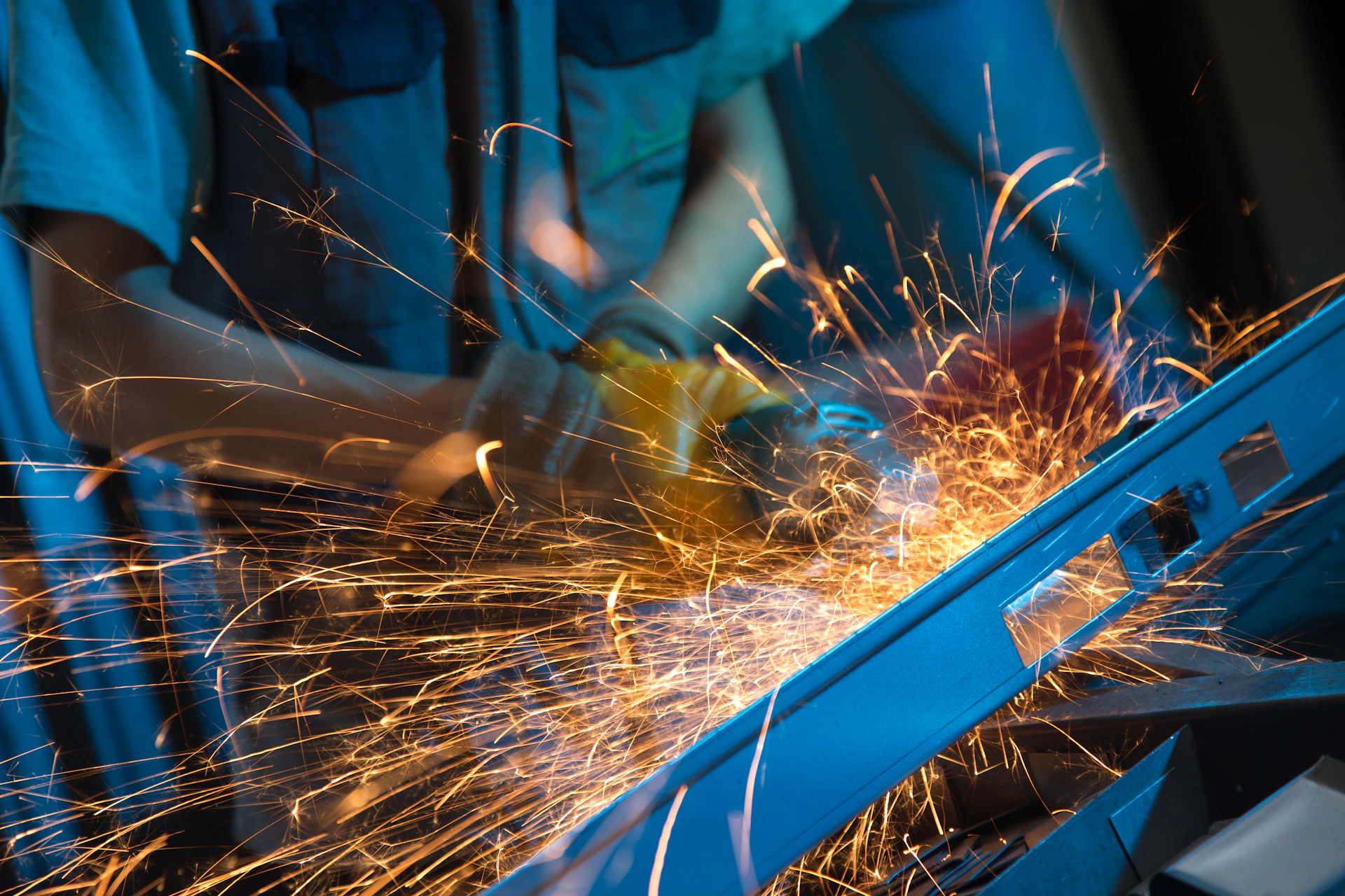 Someone is grinding metal, creating sparks.