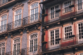 Ornate buildings with balconies and windows.