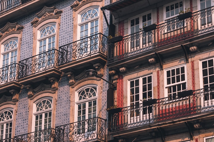 Ornate buildings with balconies and windows.