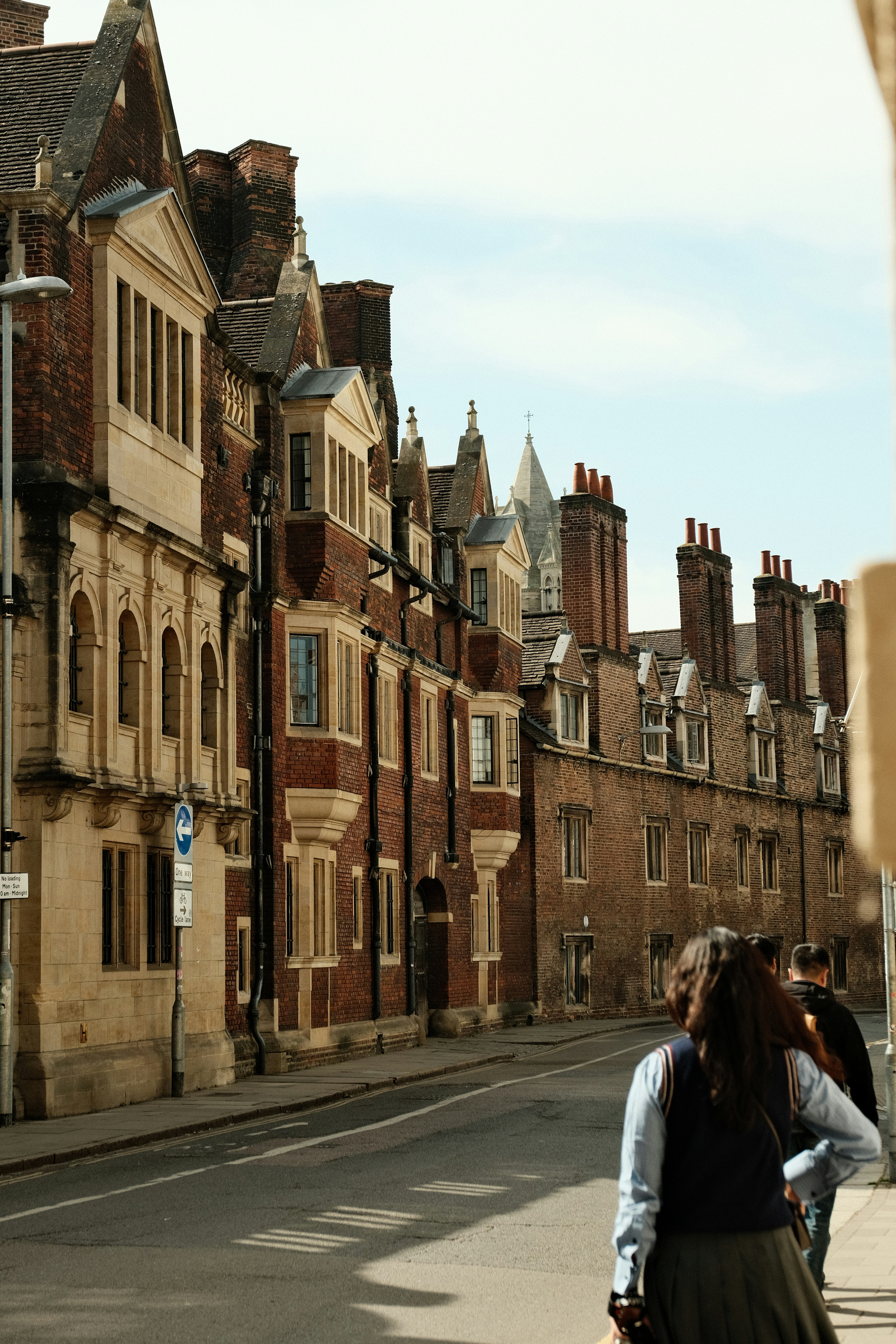Historic buildings line a city street.