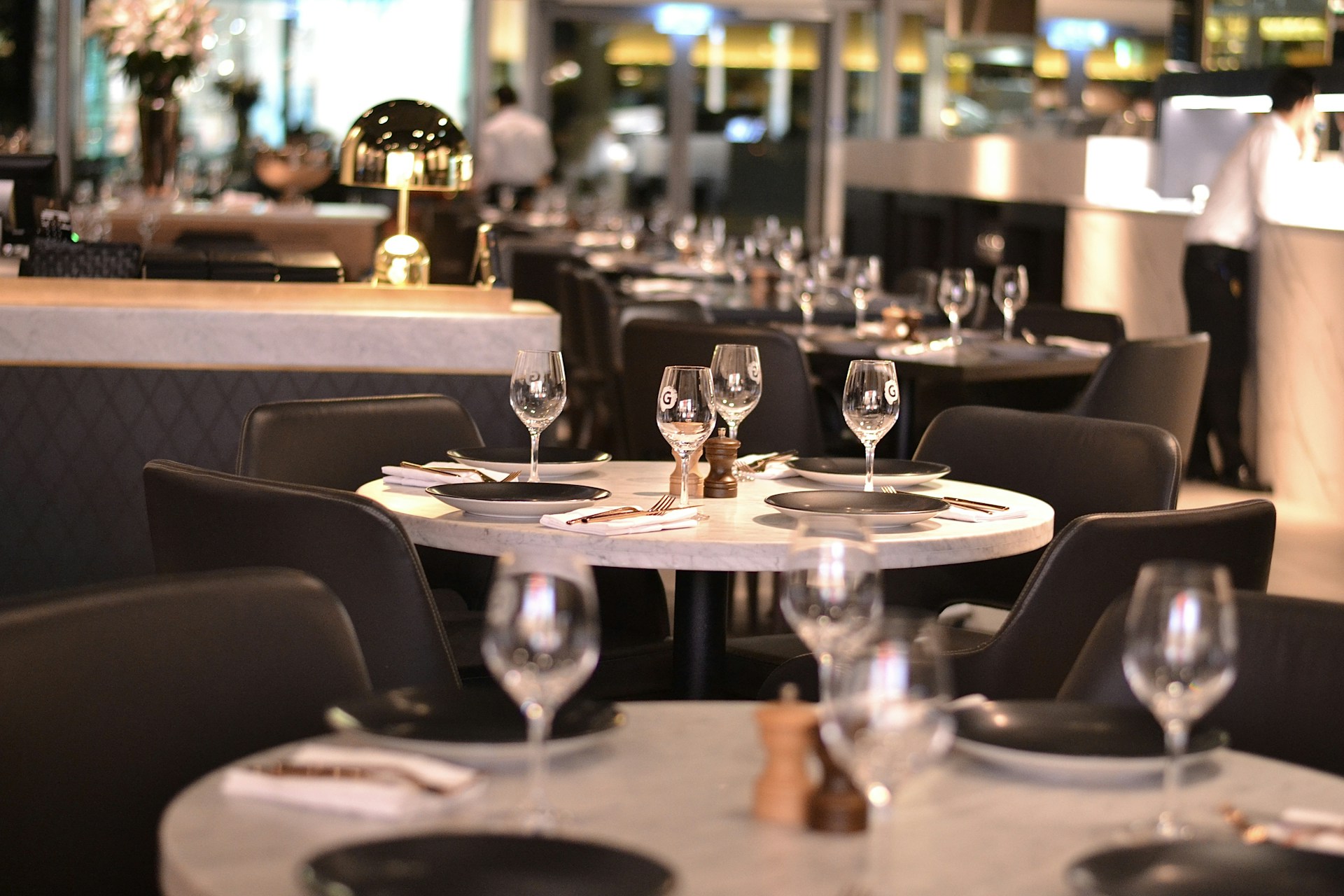 Tables are set and ready for dinner.