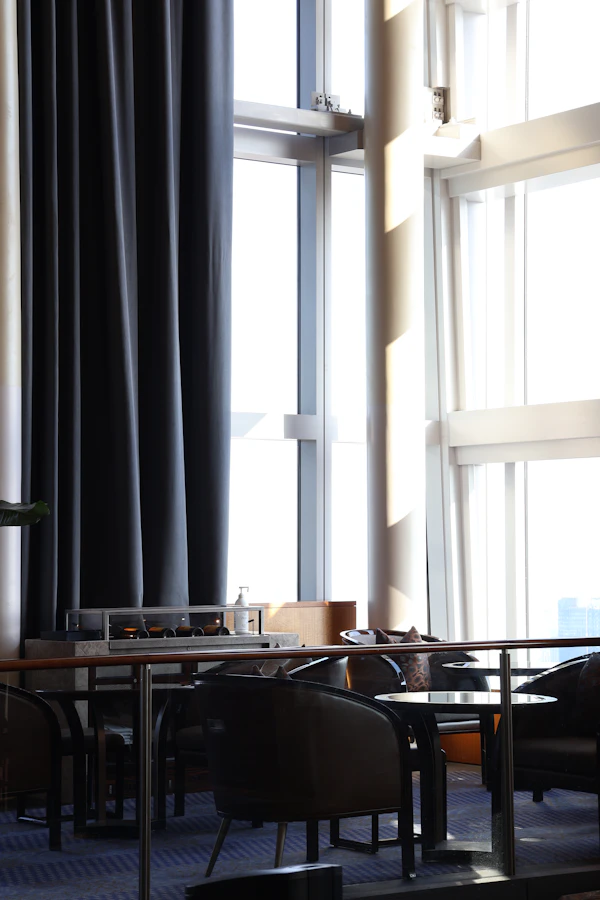 Elegant hotel interior with large windows and premium seating