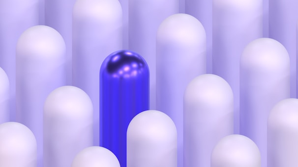 A blue cylinder stands out among others.