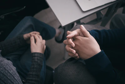 Two people are holding hands
