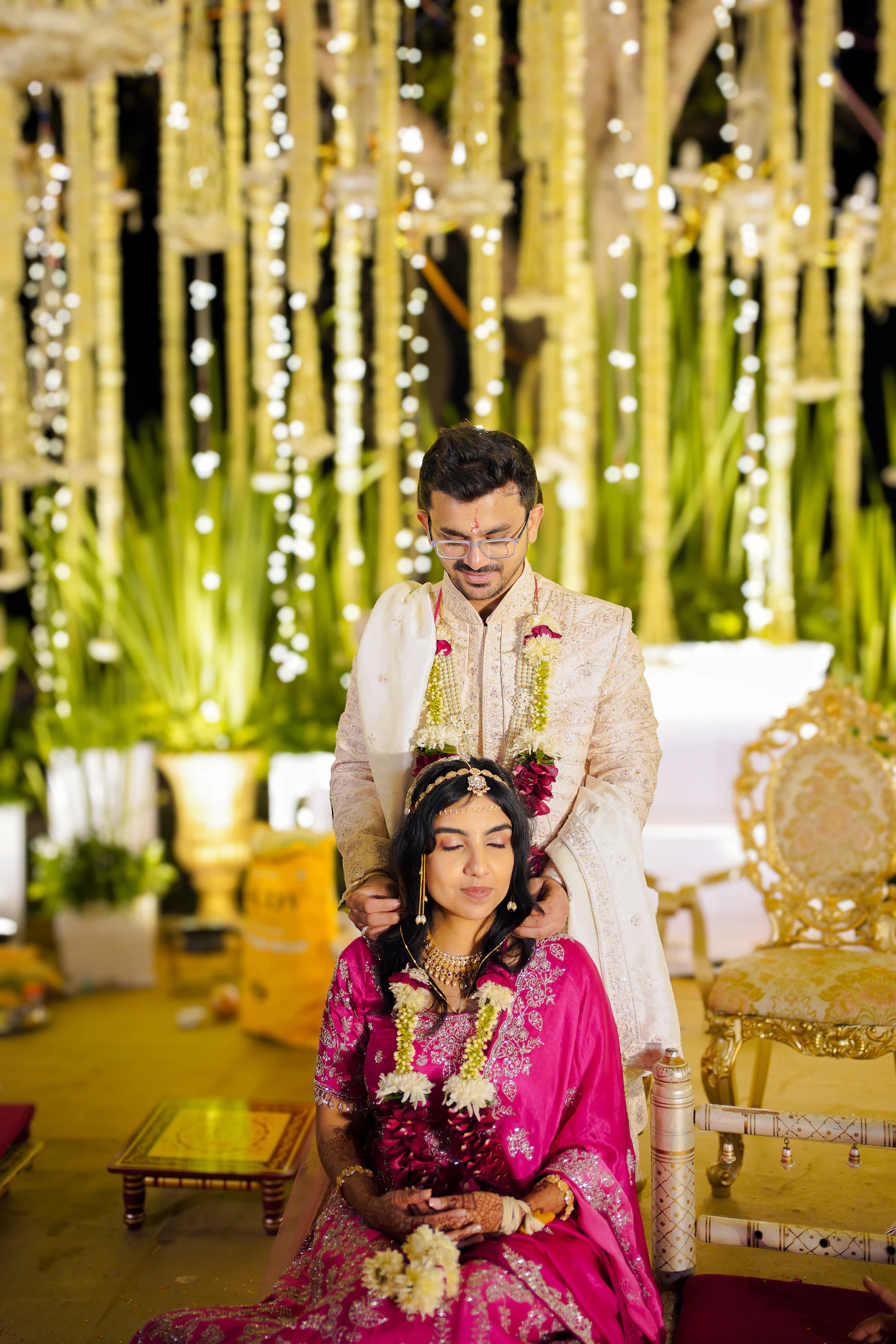 Indian wedding couple in a ceremony setting