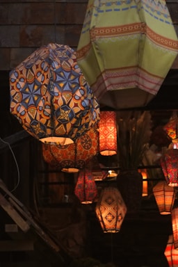 Colorful lanterns are hanging from the ceiling.