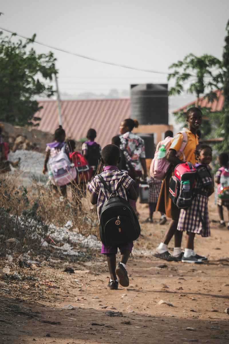 Children walking home from school, Accra, Ghana