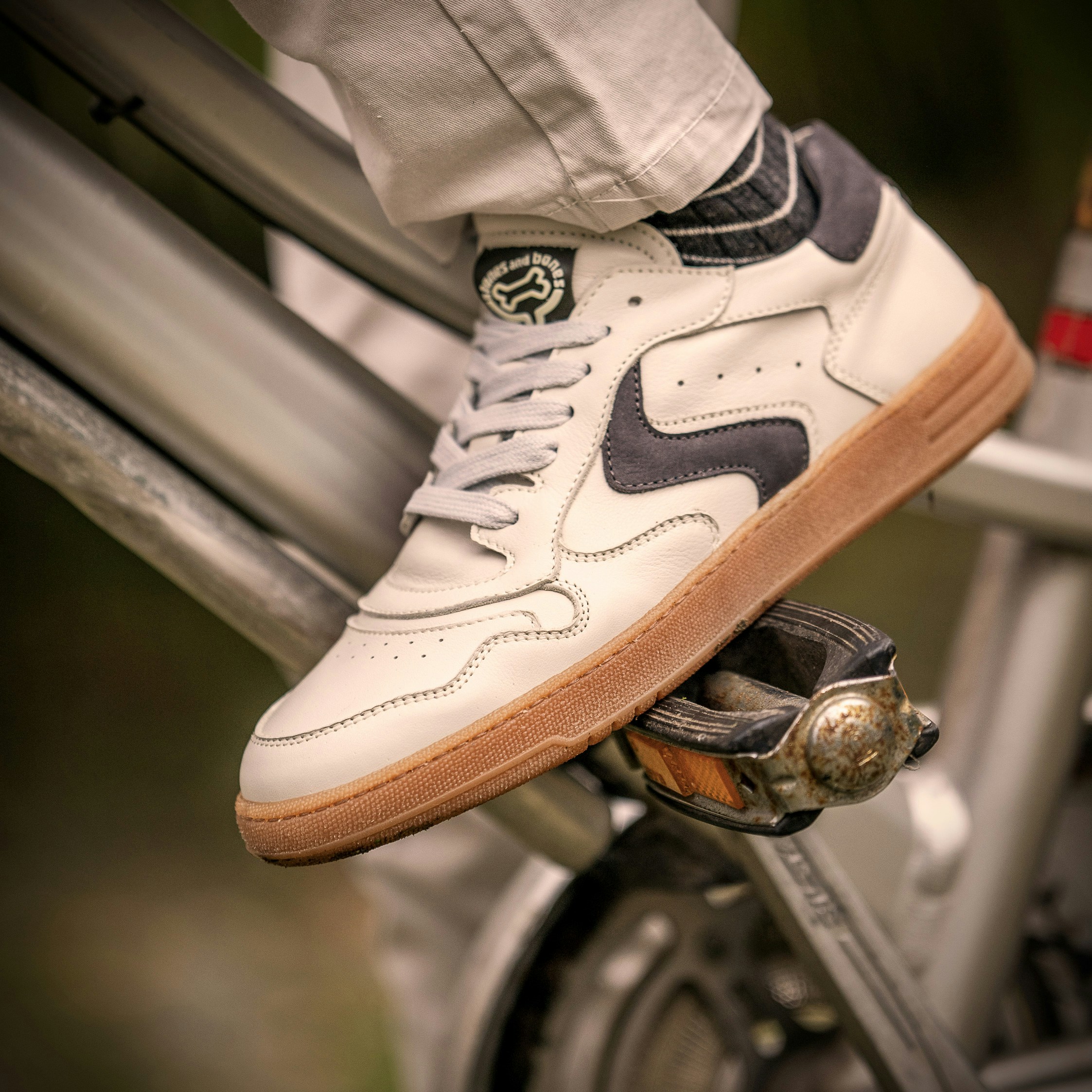 A person is pedaling a bicycle with new shoes.
